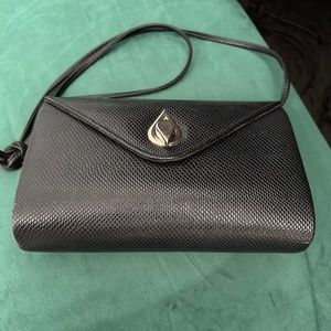 Vintage Rush Hour, black purse with shoulder strap.